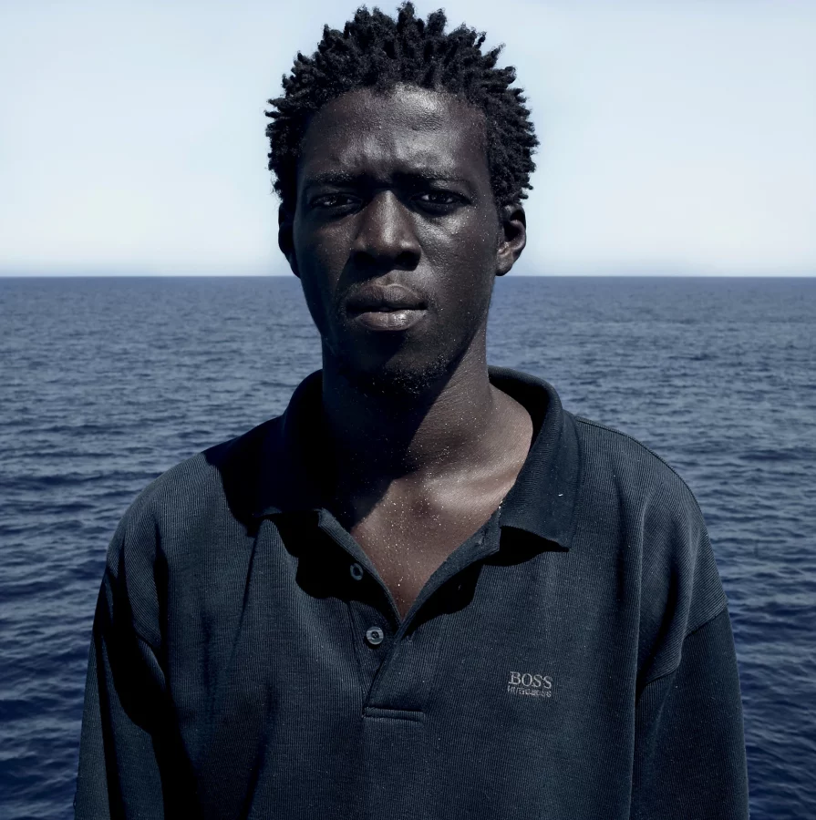 César Dezfuli. <i>Malick. 1998. Gambia. 1 de agosto de 2016. Mar Mediterráneo - Libia</i>. Courtesy of the artist