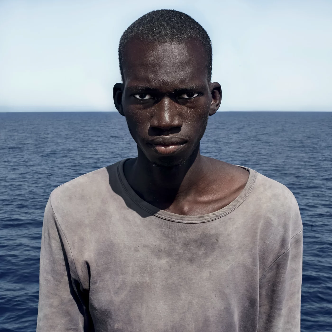 César Dezfuli. <i>Amadou. 1994. Mali. 1 de agosto de 2016. Mar Mediterráneo - Libia</i>. Courtesy of the artist.